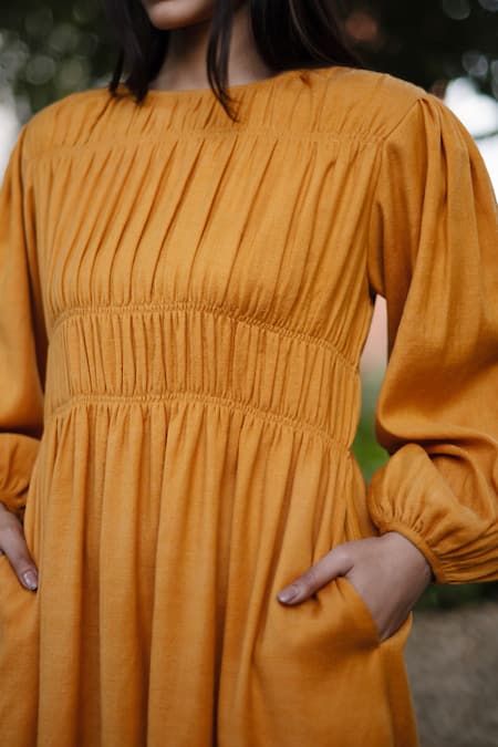 Shop_RAAS LIFE_Yellow Wool Round Neck Mustard Smocked Midi Dress _Online_at_Aza_Fashions