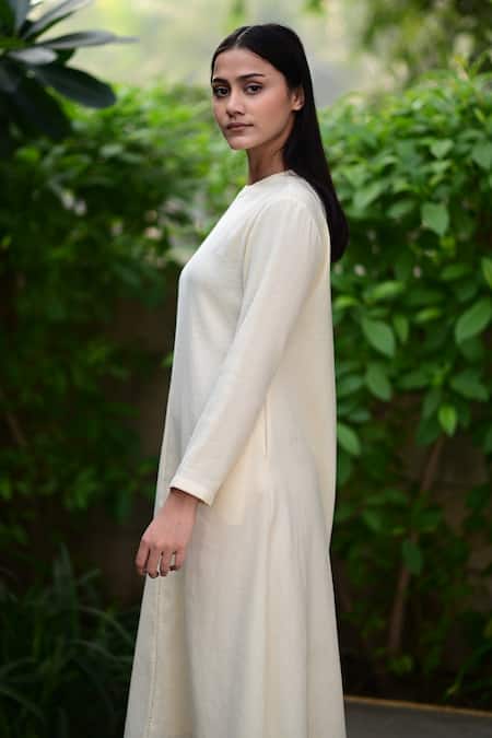 RAAS LIFE_Cream Wool Round Neck Solid Midi Dress _at_Aza_Fashions