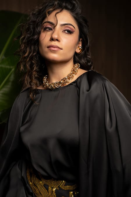 Sonam Parmar Jhawar Black Satin Embellished Round Top And Golden Skirt Set at Aza Fashions Sonam Parmar Jhawar_Black Satin Embellished Round Top And Golden Skirt Set_at_Aza_Fashions