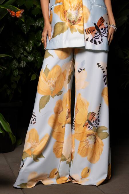 Sonam Parmar Jhawar Blue Thick Satin Printed Floral Lapel Collar Blazer And Pant Set at Aza Fashions Sonam Parmar Jhawar_Blue Thick Satin Printed Floral Lapel Collar Blazer And Pant Set_at_Aza_Fashions