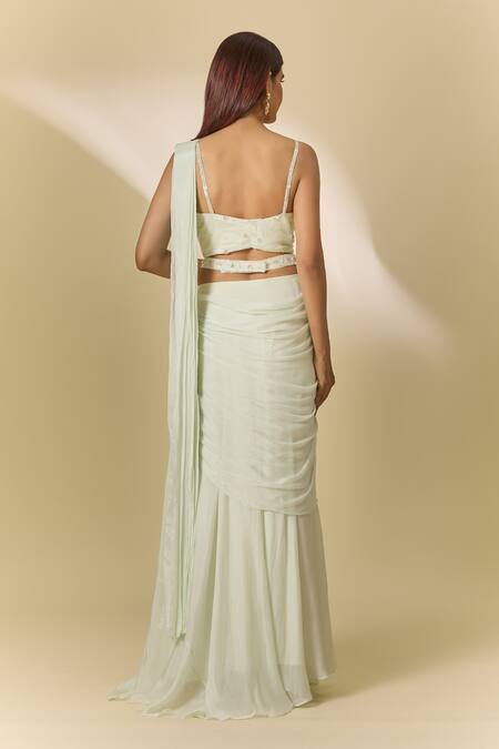 Shop Samyukta Singhania White Chiffon Cut Work, Sequins V-neck Pre-draped Saree And Embroidered Blouse at Aza Fashions Shop_Samyukta Singhania_White Chiffon Cut Work, Sequins V-neck Pre-draped Saree And Embroidered Blouse_at_Aza_Fashions