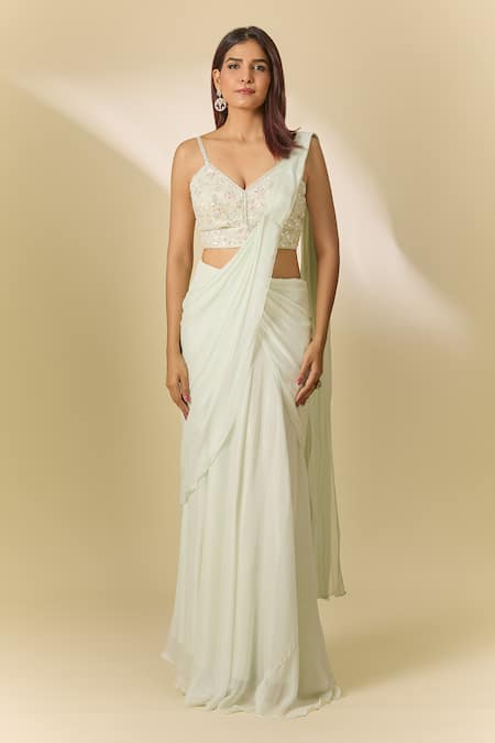 Samyukta Singhania White Chiffon Cut Work, Sequins V-neck Pre-draped Saree And Embroidered Blouse at Aza Fashions Samyukta Singhania_White Chiffon Cut Work, Sequins V-neck Pre-draped Saree And Embroidered Blouse_at_Aza_Fashions