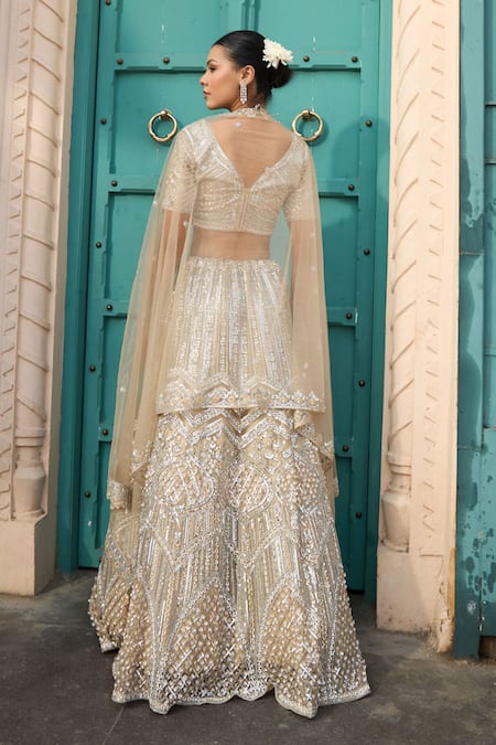 Shop_Tasuvure Indes_Ivory Net Sequins, Beads, Embroidery Scoop Neck Gold And Lehenga Set _at_Aza_Fashions