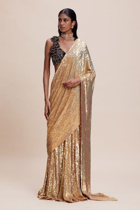 Kangana Trehan_Black Crepe, Georgette Cut Work, Sequins Gold Embellished Pre-draped Saree _at_Aza_Fashions