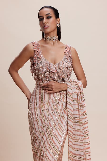 Kangana Trehan_Peach Georgette, Crepe Sequins, Fabric Flowers Asymmetric Embellished Saree Set _at_Aza_Fashions