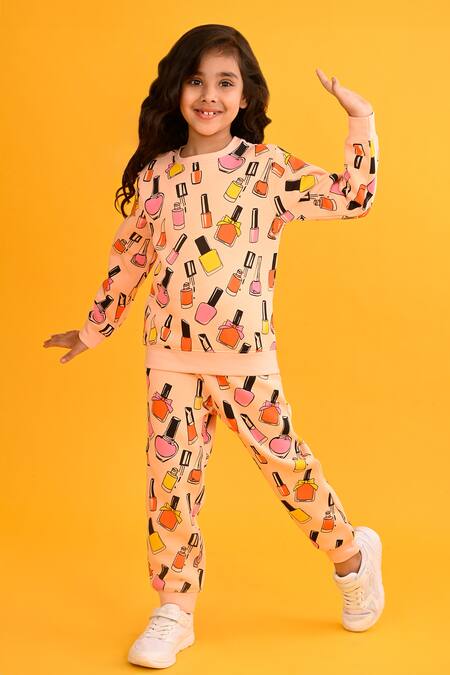 Anthrilo Peach Fleece Nailpaint Print Sweatshirt And Joggers Online at Aza Fashions Anthrilo_Peach Fleece Nailpaint Print Sweatshirt And Joggers_Online_at_Aza_Fashions