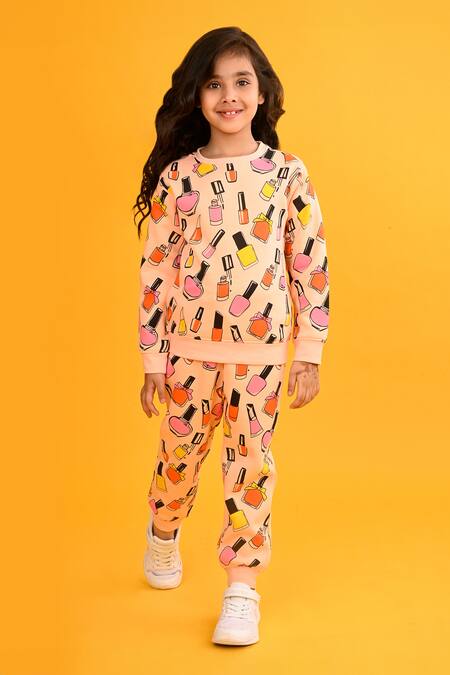 Buy Anthrilo Peach Fleece Nailpaint Print Sweatshirt And Joggers Online at Aza Fashions Buy_Anthrilo_Peach Fleece Nailpaint Print Sweatshirt And Joggers_Online_at_Aza_Fashions