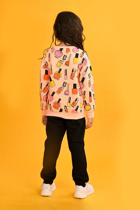 Shop Anthrilo Peach Fleece Nailpaint Print Jogger Set at Aza Fashions Shop_Anthrilo_Peach Fleece Nailpaint Print Jogger Set_at_Aza_Fashions