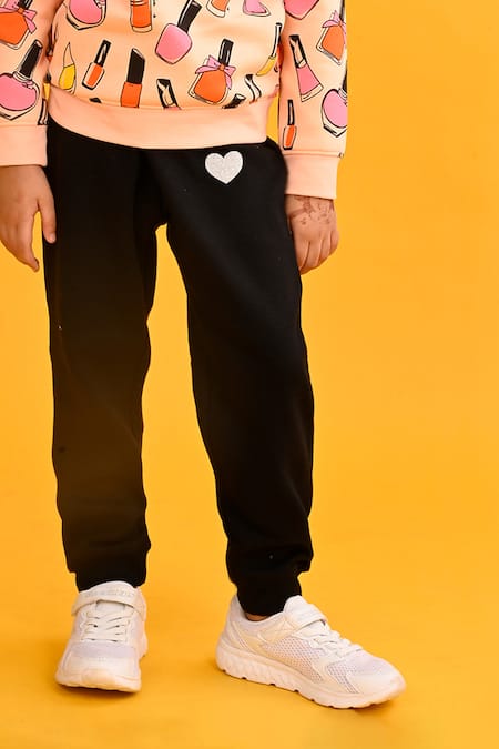 Buy Anthrilo Peach Fleece Nailpaint Print Jogger Set Online at Aza Fashions Buy_Anthrilo_Peach Fleece Nailpaint Print Jogger Set_Online_at_Aza_Fashions