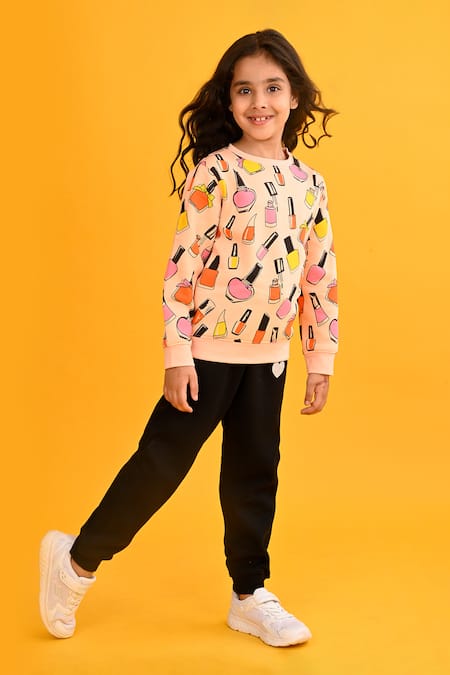 Shop Anthrilo Peach Fleece Nailpaint Print Jogger Set Online at Aza Fashions Shop_Anthrilo_Peach Fleece Nailpaint Print Jogger Set_Online_at_Aza_Fashions