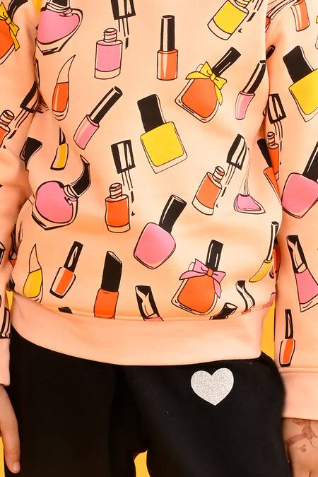 Anthrilo Peach Fleece Nailpaint Print Jogger Set at Aza Fashions Anthrilo_Peach Fleece Nailpaint Print Jogger Set_at_Aza_Fashions