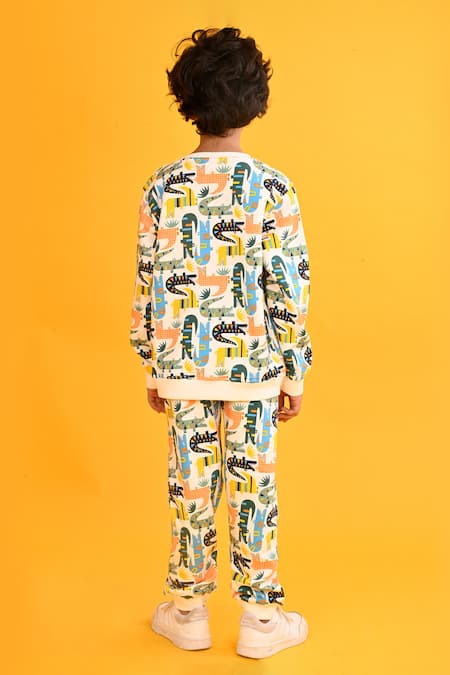 Shop Anthrilo White Fleece Dinosaur Print Sweatshirt And Joggers Set at Aza Fashions Shop_Anthrilo_White Fleece Dinosaur Print Sweatshirt And Joggers Set_at_Aza_Fashions