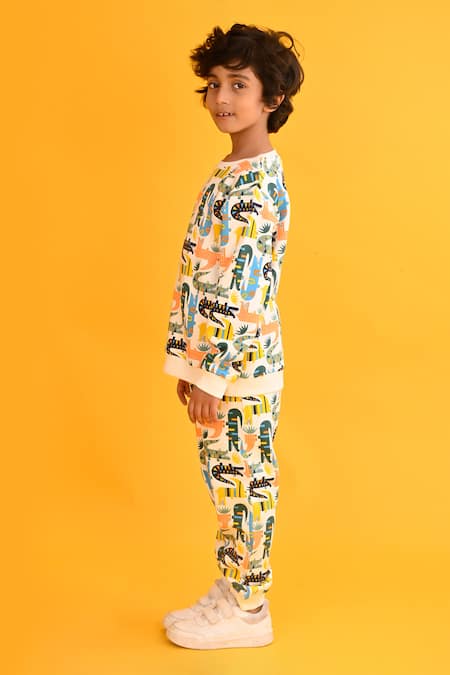 Buy Anthrilo White Fleece Dinosaur Print Sweatshirt And Joggers Set Online at Aza Fashions Buy_Anthrilo_White Fleece Dinosaur Print Sweatshirt And Joggers Set_Online_at_Aza_Fashions