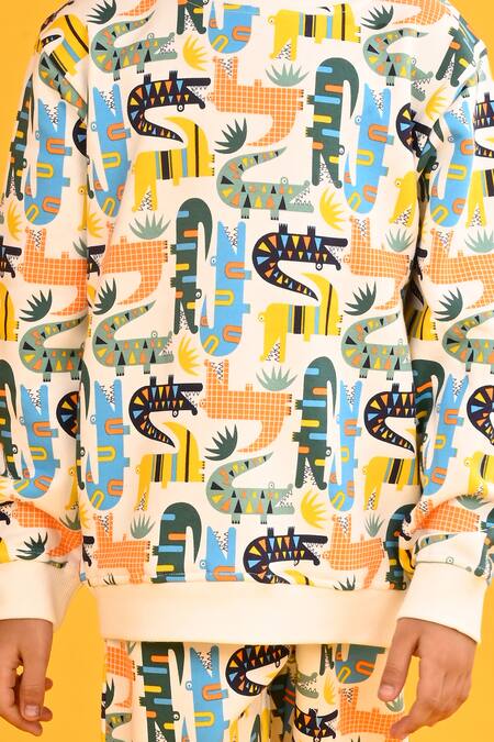 Shop Anthrilo White Fleece Dinosaur Print Sweatshirt And Joggers Set Online at Aza Fashions Shop_Anthrilo_White Fleece Dinosaur Print Sweatshirt And Joggers Set_Online_at_Aza_Fashions