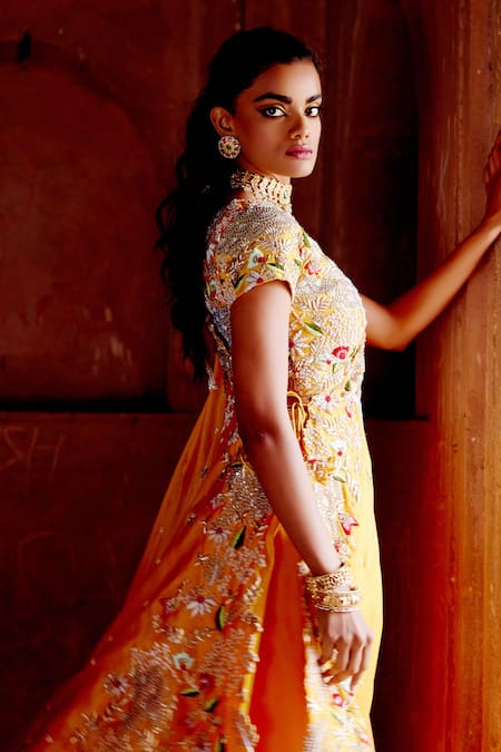 Shop Khushboo Bagri Yellow Organza, Cut Work, Tassels, Pearls, Zardozi Draped Lehenga Set at Aza Fashions Shop_Khushboo Bagri_Yellow Organza, Cut Work, Tassels, Pearls, Zardozi Draped Lehenga Set _at_Aza_Fashions