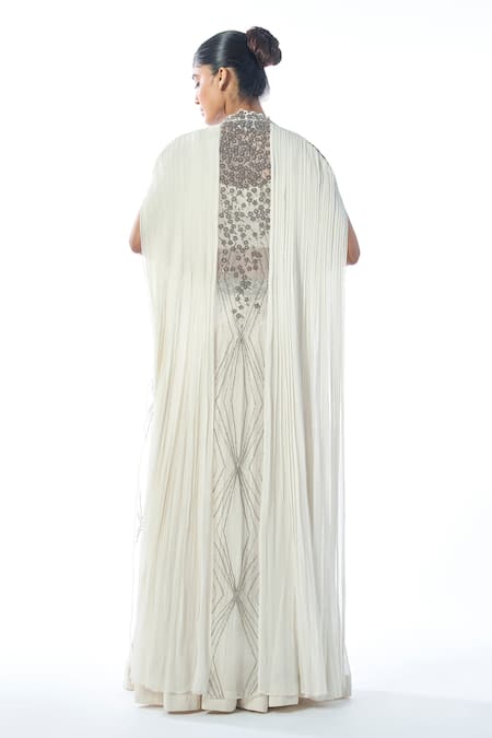 Shop Rishi And Soujit Ivory Georgette Cut Work, Embroidery Sweetheart Neck Cutdana Lehenga Set at Aza Fashions Shop_Rishi And Soujit_Ivory Georgette Cut Work, Embroidery Sweetheart Neck Cutdana Lehenga Set _at_Aza_Fashions