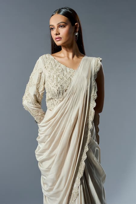 Rishi And Soujit_Ivory Crepe, Organza Cut Work, Embroidered Border Pre-draped Saree And Blouse _Online_at_Aza_Fashions