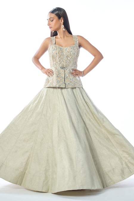 Rishi and Soujit Textured Shimmer Lehenga With Embroidered Peplum Top 