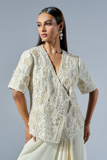 Buy Rishi And Soujit Ivory Silk, Crepe Applique V-neck Floral Wrap Top And Skirt Set Online at Aza Fashions Buy_Rishi And Soujit_Ivory Silk, Crepe Applique V-neck Floral Wrap Top And Skirt Set _Online_at_Aza_Fashions