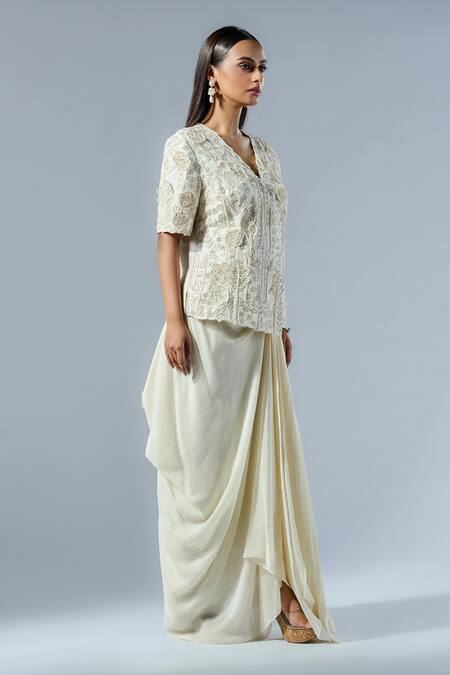 Shop Rishi And Soujit Ivory Silk, Crepe Applique V-neck Floral Wrap Top And Skirt Set Online at Aza Fashions Shop_Rishi And Soujit_Ivory Silk, Crepe Applique V-neck Floral Wrap Top And Skirt Set _Online_at_Aza_Fashions