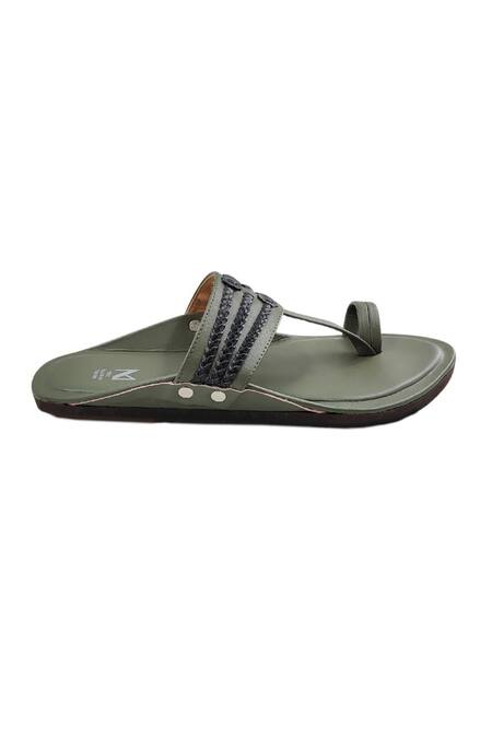 The Madras Trunk Green Woven Olive Braided Strap Kolhapuri Flats at Aza Fashions The Madras Trunk_Green Woven Olive Braided Strap Kolhapuri Flats _at_Aza_Fashions