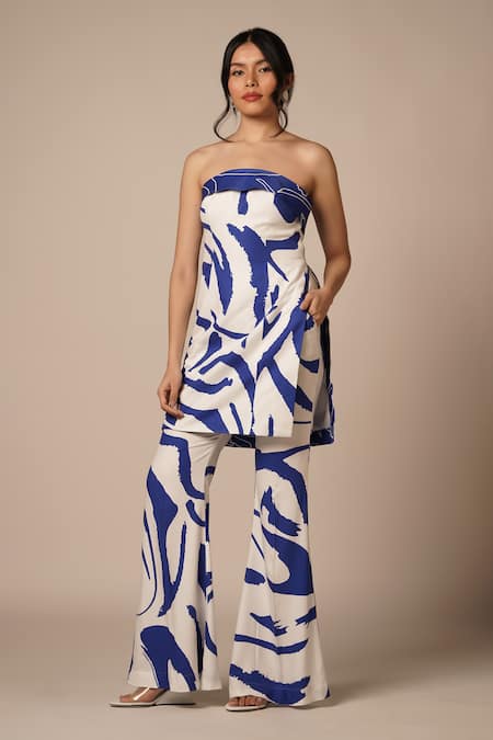 Advait_White Rayon Twill Print Abstract Swerve Blue Flared Trouser _Online_at_Aza_Fashions