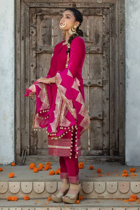 Shop Monk & Mei By Sonia Anand Fuchsia Organza, Velvet Gota Patti, Tassels Keyhole Embroidered Kurta Pant Set Online at Aza Fashions Shop_Monk & Mei By Sonia Anand_Fuchsia Organza, Velvet Gota Patti, Tassels Keyhole Embroidered Kurta Pant Set _Online_at_Aza_Fashions