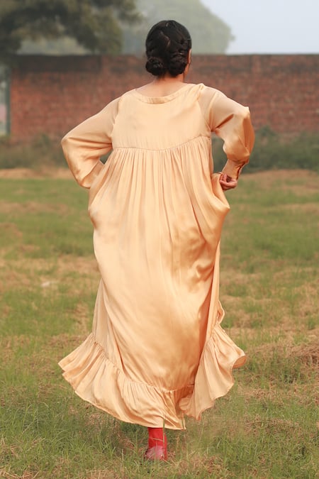 Shop Doodlage Beige Bemberg Solid Round Frilled Maxi Dress at Aza Fashions Shop_Doodlage_Beige Bemberg Solid Round Frilled Maxi Dress _at_Aza_Fashions