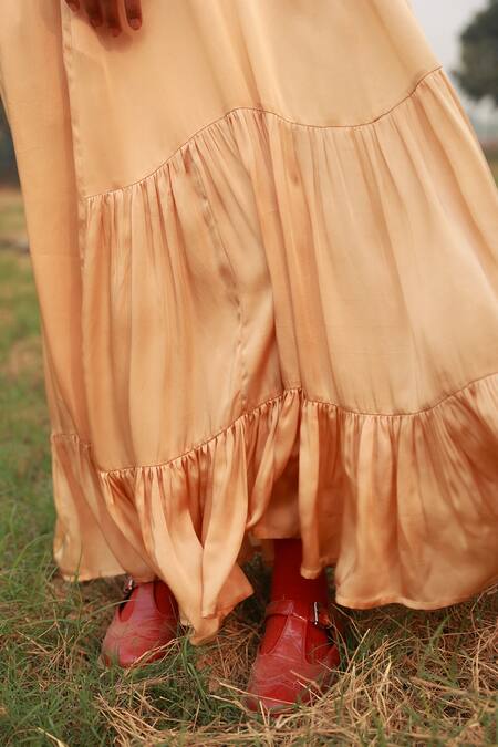 Doodlage Beige Bemberg Solid Round Frilled Maxi Dress at Aza Fashions Doodlage_Beige Bemberg Solid Round Frilled Maxi Dress _at_Aza_Fashions