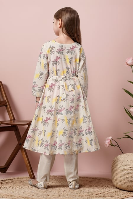 Shop Petite Pomme Cream Cotton Embroidery, Lace Floral Print Yoke Anarkali And Trouser Set at Aza Fashions Shop_Petite Pomme_Cream Cotton Embroidery, Lace Floral Print Yoke Anarkali And Trouser Set _at_Aza_Fashions