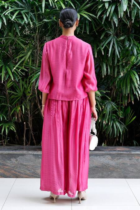 Shop Eeda Pink Viscose Silk Patchwork Band Collar Floral Top And Flared Pant Set at Aza Fashions Shop_Eeda_Pink Viscose Silk Patchwork Band Collar Floral Top And Flared Pant Set _at_Aza_Fashions
