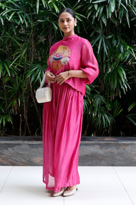 Eeda Pink Viscose Silk Patchwork Band Collar Floral Top And Flared Pant Set at Aza Fashions Eeda_Pink Viscose Silk Patchwork Band Collar Floral Top And Flared Pant Set _at_Aza_Fashions