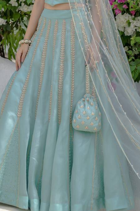 Vridhi Somaani_Green Net, Organza Zari, Embroidery Sweetheart Neck Zardozi Sage Lehenga Set _Online_at_Aza_Fashions