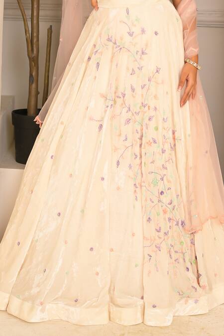 Buy_Vridhi Somaani_Ivory Silk, Net, Velvet Pearls, Sequins V-neck Floral Embroidered Lehenga Set _Online_at_Aza_Fashions