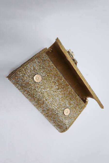 Buy_Adwita Bags & Jewels_Gold Cut Dana Embellished Handbag _Online_at_Aza_Fashions