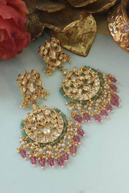 Shop Riana Jewellery White Floral Crescent Chandbalis at Aza Fashions Shop_Riana Jewellery_White Floral Crescent Chandbalis _at_Aza_Fashions