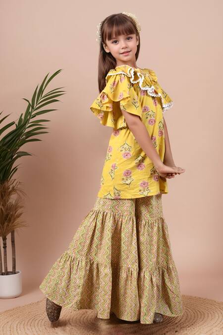 Petite Pomme Yellow Cotton Lace Floral Print One Shoulder Kurta Set at Aza Fashions Petite Pomme_Yellow Cotton Lace Floral Print One Shoulder Kurta Set _at_Aza_Fashions