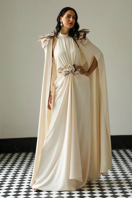Supria Munjal_Off White Crepe Pearls, Fabric Flowers Halter 3d Floral Applique Gown With Cape _Online_at_Aza_Fashions