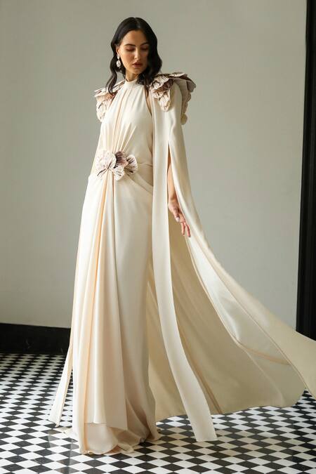 Buy_Supria Munjal_Off White Crepe Pearls, Fabric Flowers Halter 3d Floral Applique Gown With Cape _Online_at_Aza_Fashions