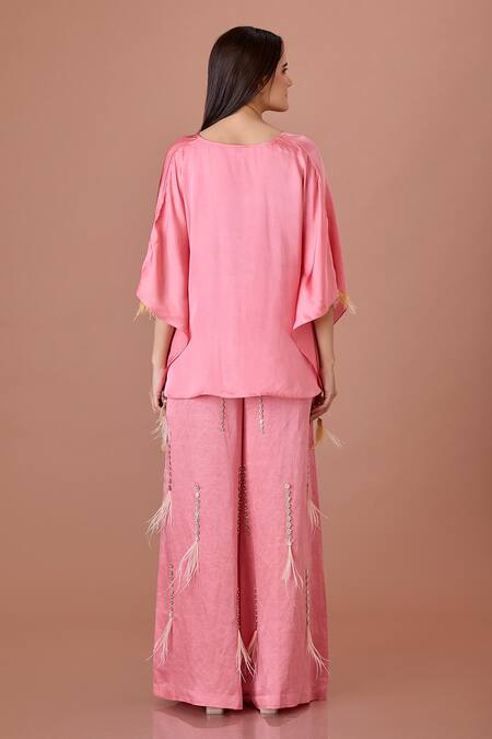 Shop Dilnaz Pink Blended Satin Embroidery Feather Tassels Plunge Twisted Front Yoke Kaftan at Aza Fashions Shop_Dilnaz_Pink Blended Satin Embroidery Feather Tassels Plunge Twisted Front Yoke Kaftan_at_Aza_Fashions