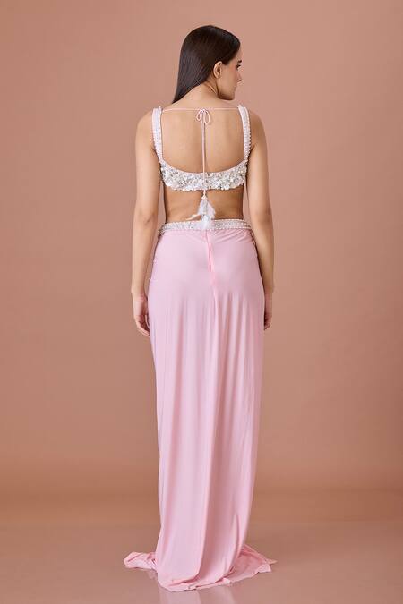 Shop Dilnaz Pink Net, Lycra, Silk Satin Sequins, Pearls Bloom Blouse And Draped Skirt Set at Aza Fashions Shop_Dilnaz_Pink Net, Lycra, Silk Satin Sequins, Pearls Bloom Blouse And Draped Skirt Set_at_Aza_Fashions