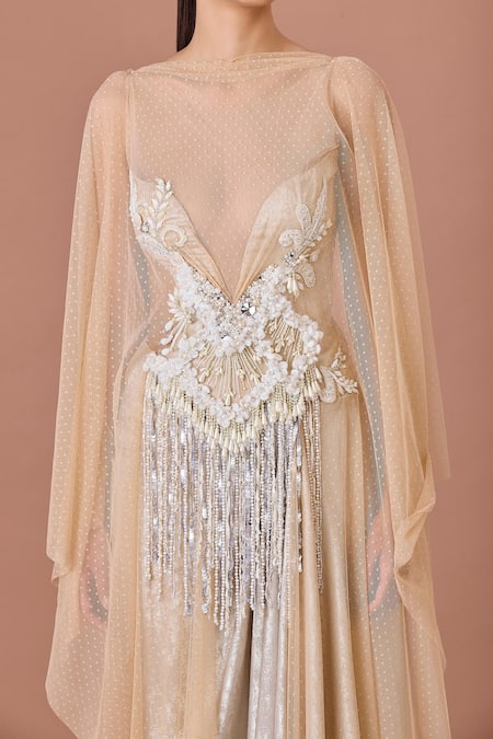 Dilnaz Beige Net Sequins, Stones, Feathers Boat Neck Embellished Winged Sleeves Gown Online at Aza Fashions Dilnaz_Beige Net Sequins, Stones, Feathers Boat Neck Embellished Winged Sleeves Gown_Online_at_Aza_Fashions