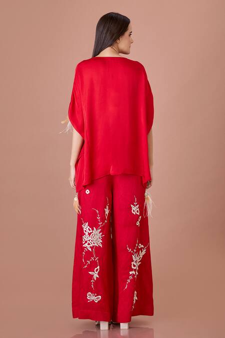 Shop Dilnaz Red Blended Linen Embroidered Gara Flared Trouser at Aza Fashions Shop_Dilnaz_Red Blended Linen Embroidered Gara Flared Trouser_at_Aza_Fashions