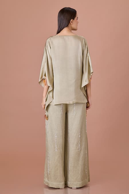 Shop Dilnaz Green Blended Linen Embellished Crystal Flared Trouser at Aza Fashions Shop_Dilnaz_Green Blended Linen Embellished Crystal Flared Trouser_at_Aza_Fashions