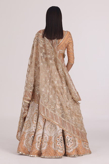 Shop Abhinav Mishra Gold Net, Chanderi Gota Patti, Mirrors, Zari, Embroidery, Bloom Lehenga Set at Aza Fashions Shop_Abhinav Mishra_Gold Net, Chanderi Gota Patti, Mirrors, Zari, Embroidery, Bloom Lehenga Set _at_Aza_Fashions