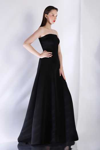 Ozeqo_Black Neoprene Off-shoulder Strapless Solid Maxi Dress _at_Aza_Fashions