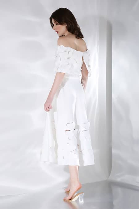 Shop Ozeqo Off White Neoprene Cut Work Off-shoulder Floral Cut-out Midi Dress With Cape at Aza Fashions Shop_Ozeqo_Off White Neoprene Cut Work Off-shoulder Floral Cut-out Midi Dress With Cape _at_Aza_Fashions