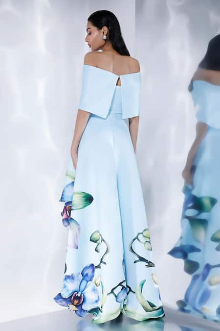 Shop Ozeqo White Neoprene Off-shoulder Asymmetric Orchid Print Dress With Cape at Aza Fashions Shop_Ozeqo_White Neoprene Off-shoulder Asymmetric Orchid Print Dress With Cape _at_Aza_Fashions