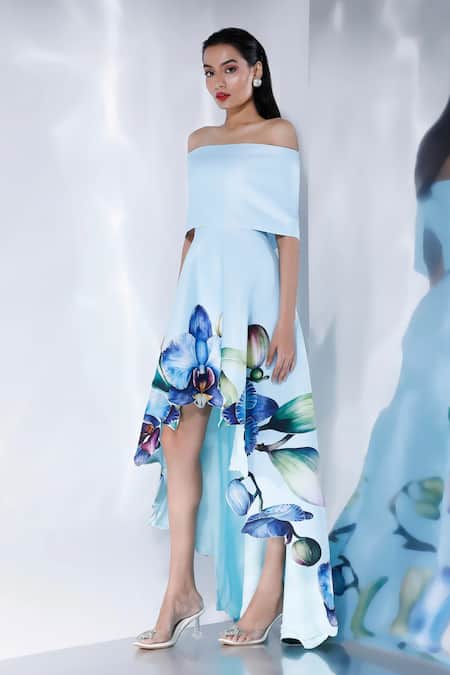 Shop Ozeqo White Neoprene Off-shoulder Asymmetric Orchid Print Dress With Cape Online at Aza Fashions Shop_Ozeqo_White Neoprene Off-shoulder Asymmetric Orchid Print Dress With Cape _Online_at_Aza_Fashions