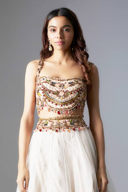 Rocky Star Ivory Net Beads, Embroidery, Crystals Floral Tribal Blouse And Lehenga Set Online at Aza Fashions Rocky Star_Ivory Net Beads, Embroidery, Crystals Floral Tribal Blouse And Lehenga Set _Online_at_Aza_Fashions